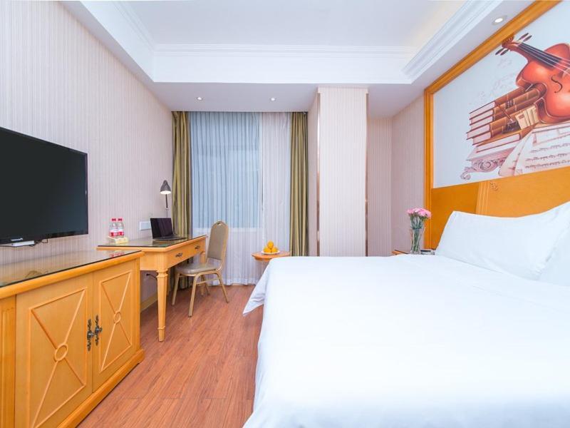 Vienna Hotel Hubei Xiangyang Tanxi Road Bagian luar foto